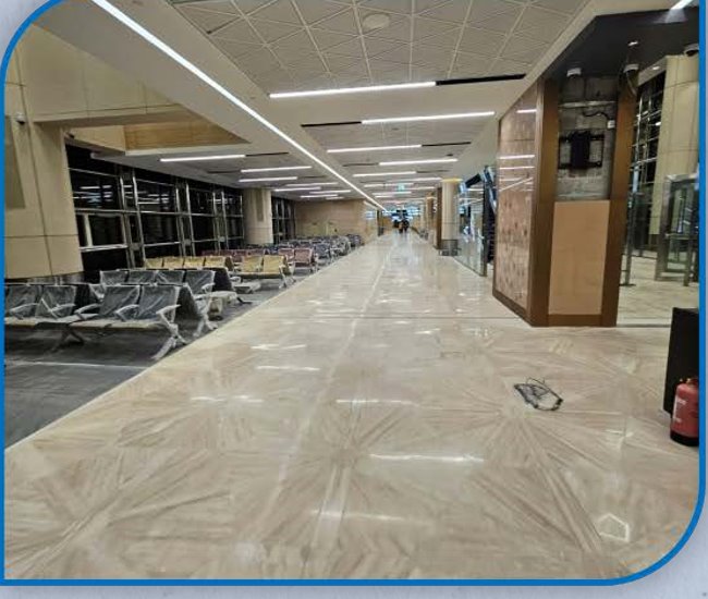 Travertine flooring and finishing works at King Khalid International Airport Concourse H